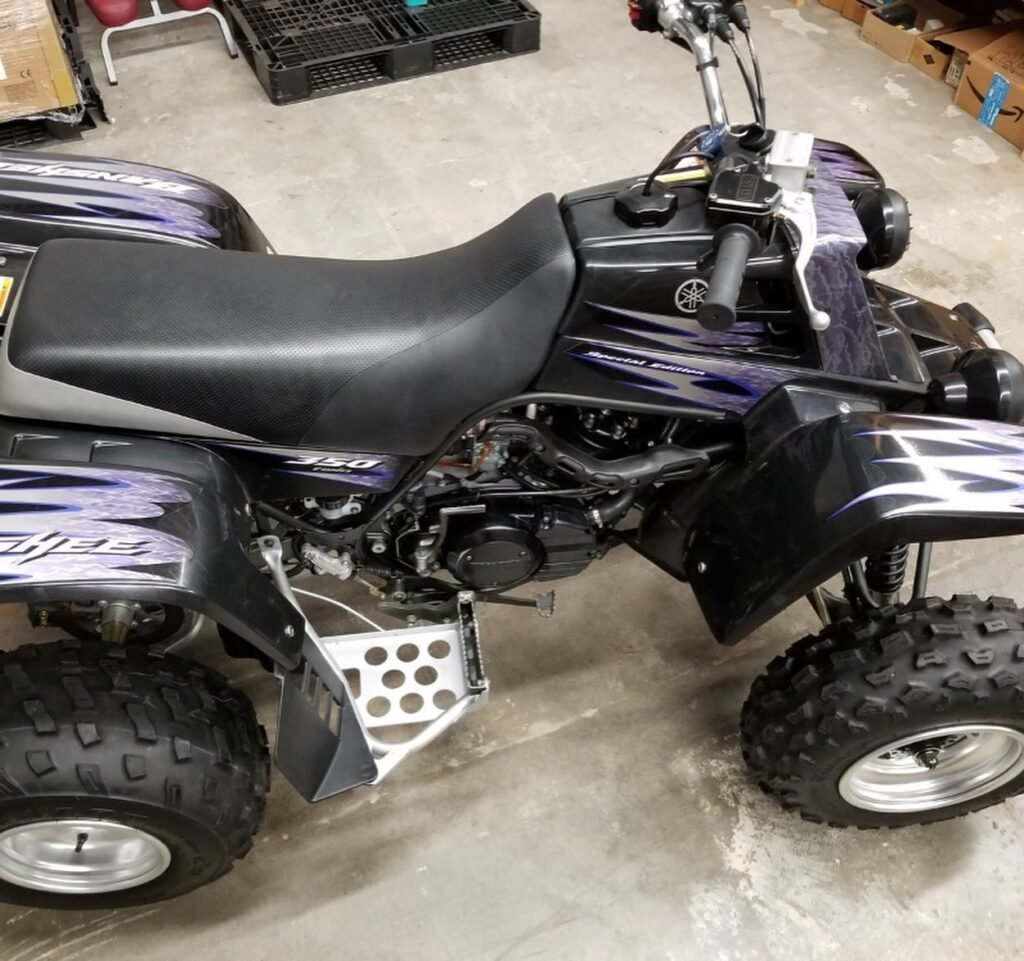 2005 Yamaha Banshee 350 Special Edition – The Final Legend The 2005 Yamaha Banshee 350 Special Edition represents the end of an era. As one of the final production years before Yamaha discontinued this legendary machine, the 2005 model is highly sought after by collectors and riders alike. The Special Edition features exclusive yellow and black graphics, distinguishing it from all other Banshees and making it the crown jewel of any collection. Why the 2005 Special Edition Matters: Final year of US production (2006 was last in some markets, but 2005 is peak collectible) Exclusive Special Edition yellow plastics with black flame/racing graphics Black front bumper, grab bar, and heel guards (SE-specific) Rare factory aluminum wheels with polished lip Among the lowest production numbers of any Banshee year Engine & Performance: 347cc liquid-cooled parallel-twin two-stroke Dual Mikuni TM28 carburetors 6-speed manual transmission Approximately 34–38 horsepower – lightweight, raw, and violent power delivery Suspension & Brakes: Front: Double wishbone with 7.9" travel, preload-adjustable shocks Rear: Swingarm with 8.7" travel Hydraulic disc brakes front and rear Condition Details: All-original Special Edition plastics – no cracks, minimal fading Original SE graphics intact (rare) Low hours – weekend toy, never raced Clean title in hand Recent service: fresh transmission fluid, air filter cleaned, new spark plugs Tires: 80% tread remaining What's Included: Factory service manual (digital copy) Spare air filter Original keys (2) Price: [Insert Price] Location: [City, State] Contact: [Email / Phone] The 2005 Special Edition doesn't come up often. Once it's gone, it's gone – just like the Banshee itself.