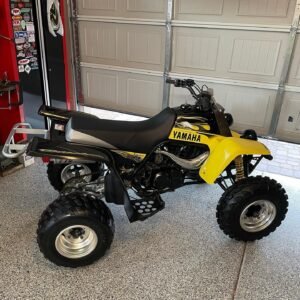 2003 Yamaha Banshee 350 – The Ultimate Sport ATV The 2003 Yamaha Banshee 350 needs no introduction. As one of the most legendary sport quads ever built, its twin-cylinder, two-stroke engine delivers screaming power, razor-sharp handling, and an adrenaline rush that modern four-strokes simply can't match. Whether you're dragging down sand dunes, carving through trails, or reliving the golden era of ATVs, this Banshee is a true icon. Engine & Performance: 347cc liquid-cooled, parallel-twin two-stroke engine Dual Mikuni carburetors for crisp throttle response 6-speed manual transmission with manual clutch Classic Banshee powerband hit – unpredictable, raw, and addictive Chassis & Suspension: Double-wishbone front suspension with 7.9 inches of travel Swingarm rear suspension with 8.7 inches of travel Front disc brakes / rear disc brake Lightweight steel frame for nimble cornering Condition & Features: Low original hours (verified) Clean frame – no cracks or major rust Aftermarket tires with excellent tread Fresh top-end rebuild (if applicable – adjust as needed) Includes original owner's manual (if available) Why Buy From The Banshee Broker? Every Banshee we list undergoes a thorough mechanical inspection. We specialize in nothing but Yamaha Banshees, so you're buying from enthusiasts who know the platform inside and out.